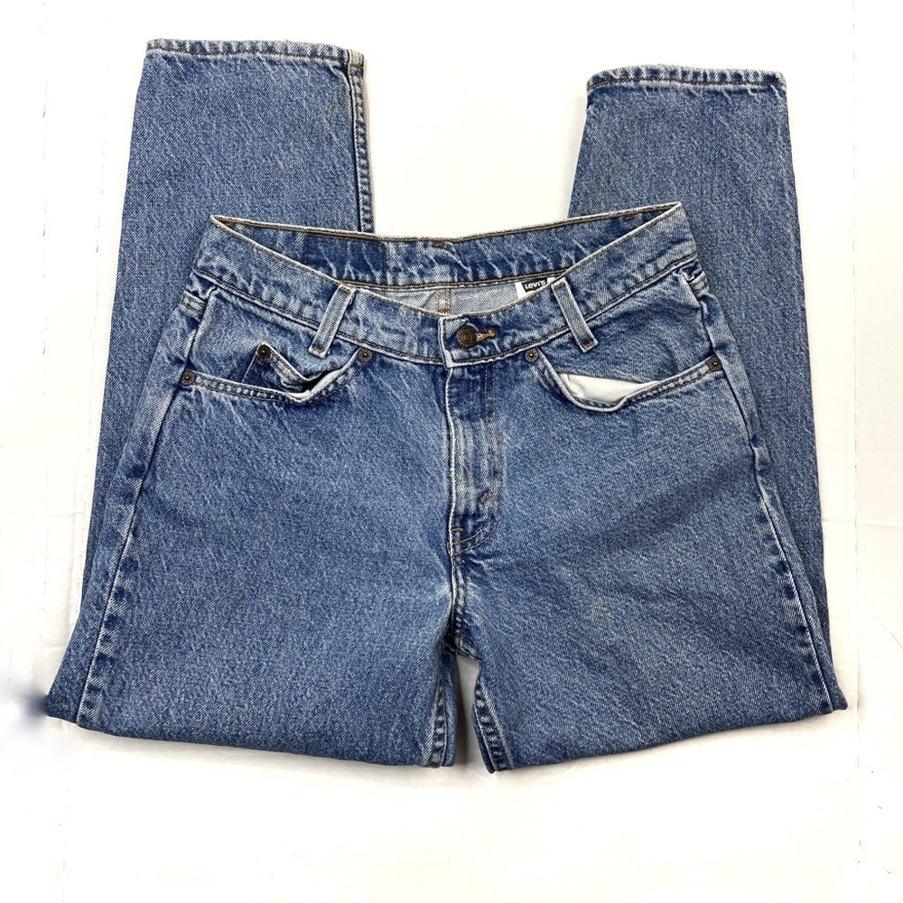 vintage Levi’s 550 Lightwash stiff orange label tapered leg jean